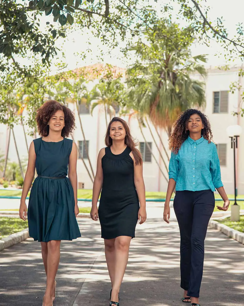 Three women walking side-by-side - HSP personal branding